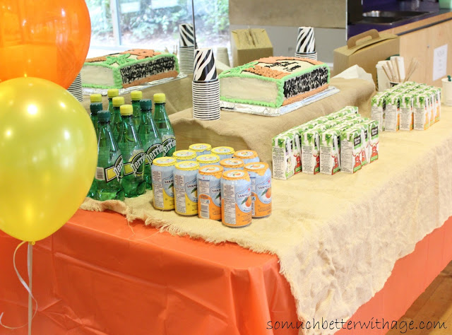 Safari birthday party / drink table and balloons - So Much Better With Age