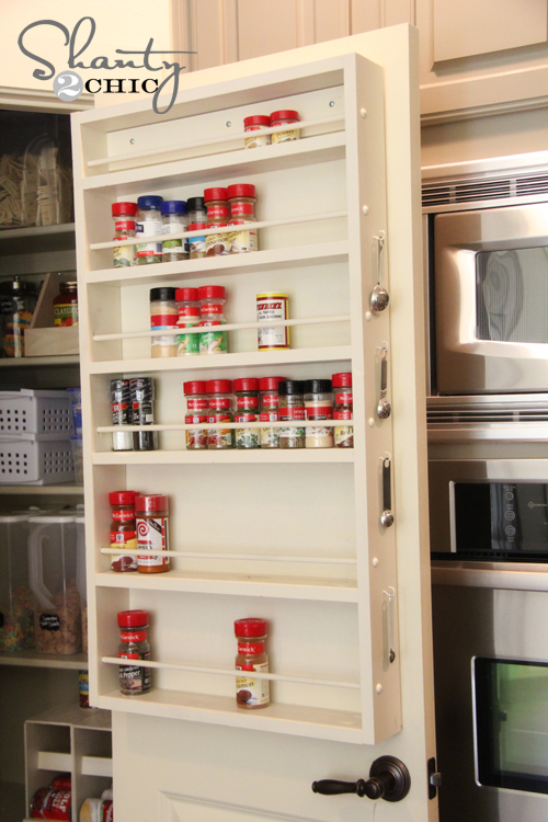 There is a whole shelf unit on the back of the door of this pantry.