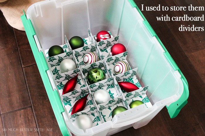 Christmas ornaments in storage bin with dividers. 