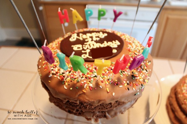 A chocolate sprinkled birthday cake.