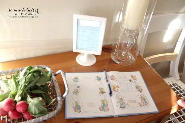 Guest book table with the opened guest book.