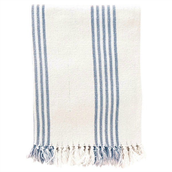 A white and blue striped throw blanket.
