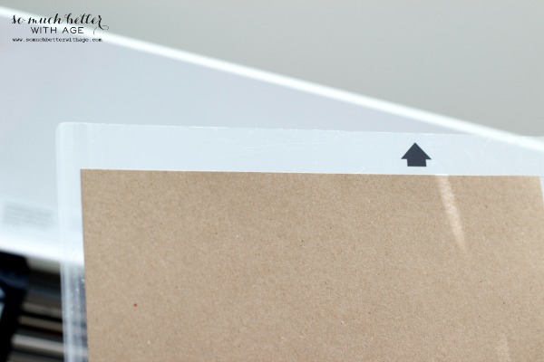 Load cutting mat / Newbie silhouette cameo tutorial via somuchbetterwithage.com Loading up the cutting mat.