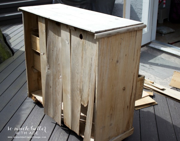 The back of the dresser all broken away.