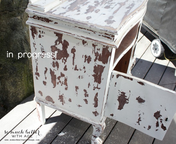 A piece of furniture being distressed, in progress.