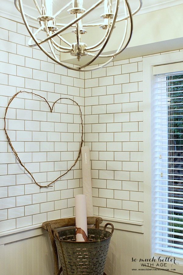 A chandelier in the kitchen beside the heart.