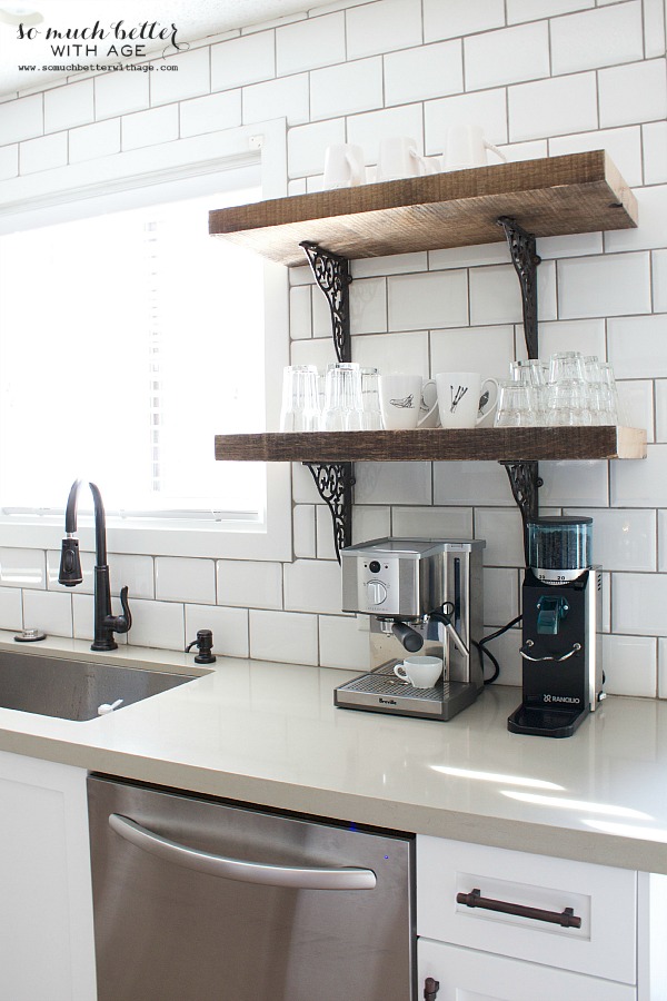 Wood shelves with black wrought iron.