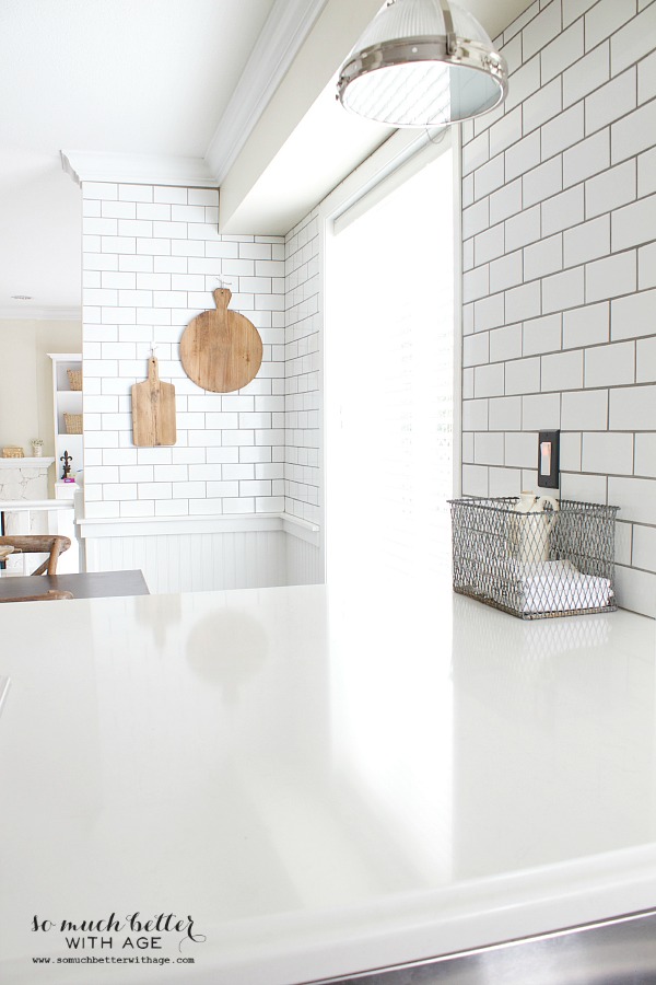 White subway tile in the kitchen.