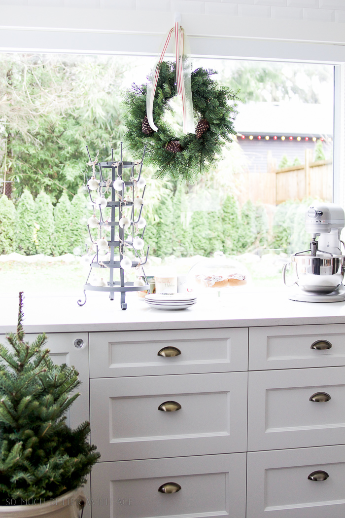  Christmas kitchen tour 2016 / Kitchen Christmas wreaths hanging  - So Much Better With Age