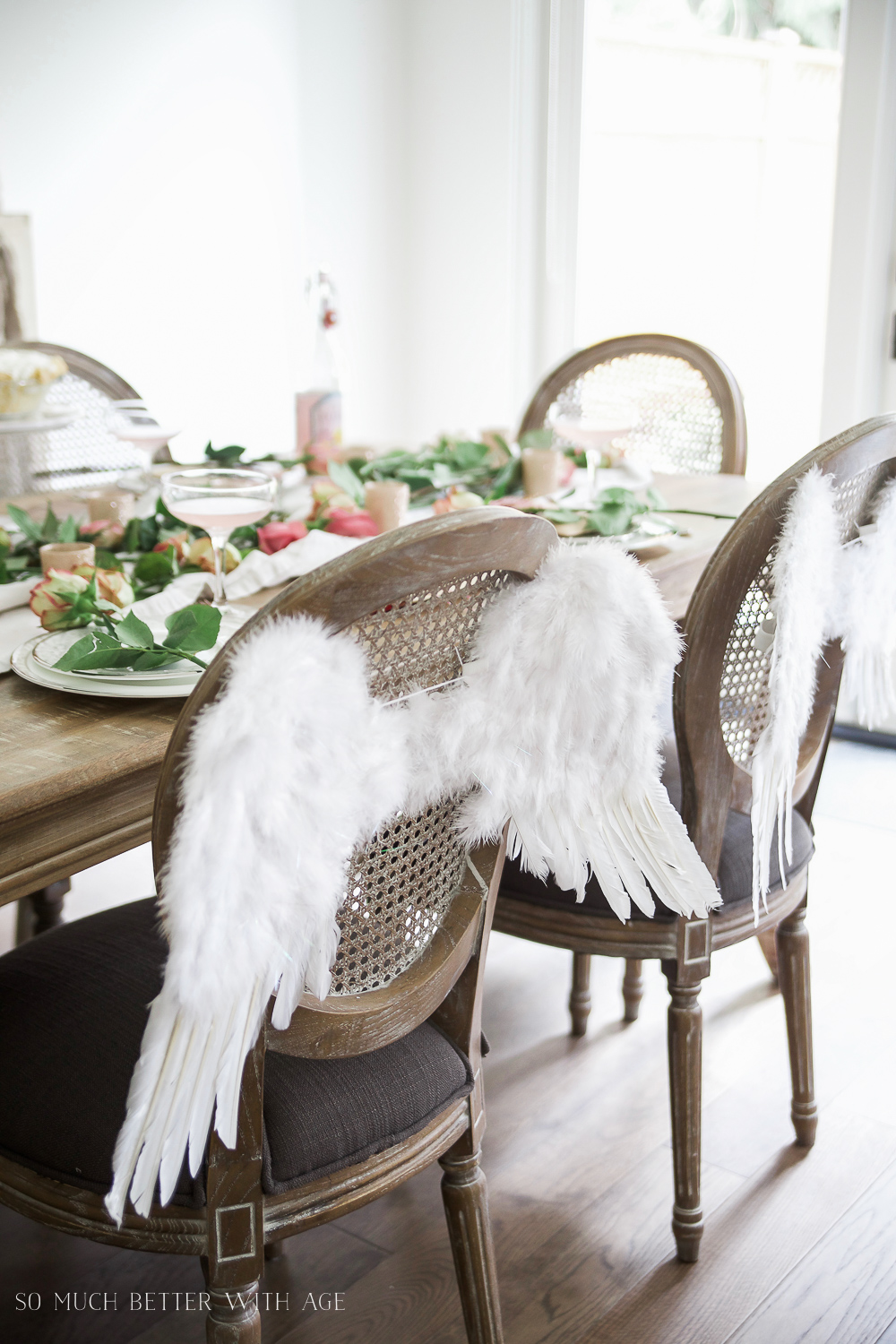 White feathered angles wings on the chairs.