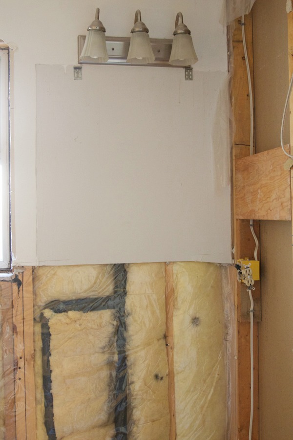There is exposed electrical sockets in the bathroom.