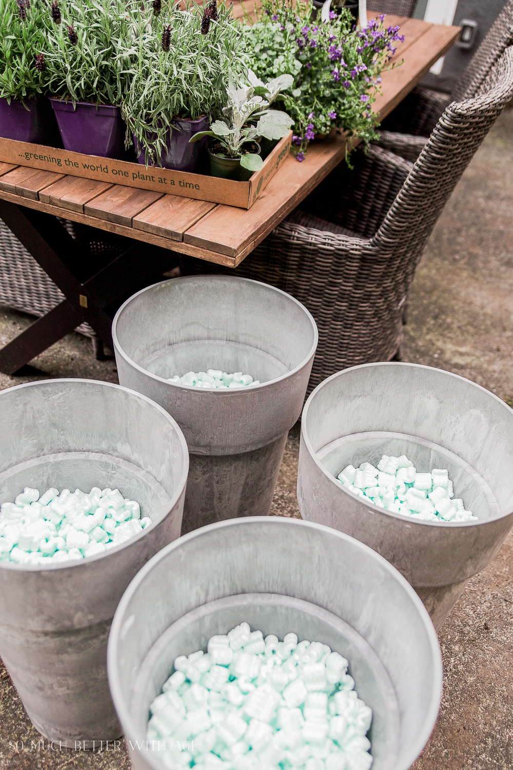 Packing pearls in bottom of pot are an easy filler and reduces weight.