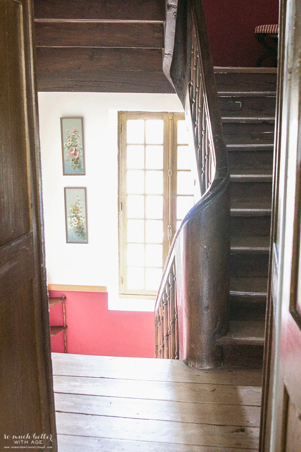 A curved wooden staircase.