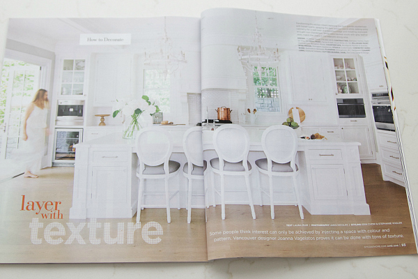 Page in magazine opened to kitchen.