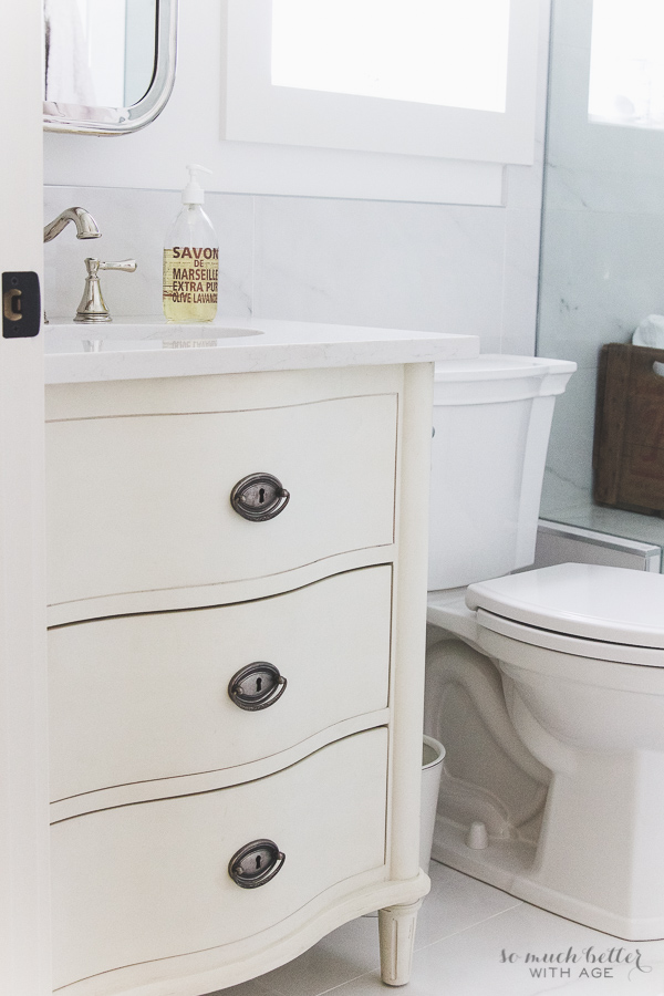 Bathroom vanity look like dresser, from Restoration Hardware.