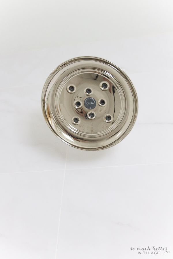  Delta polished nickel shower head.