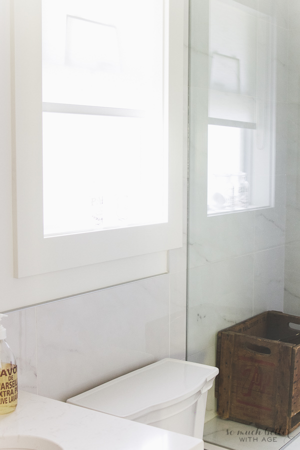  New custom bathroom using porcelain tile that looks like carrara marble.