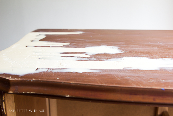 Sanded wood putty on top of furniture.