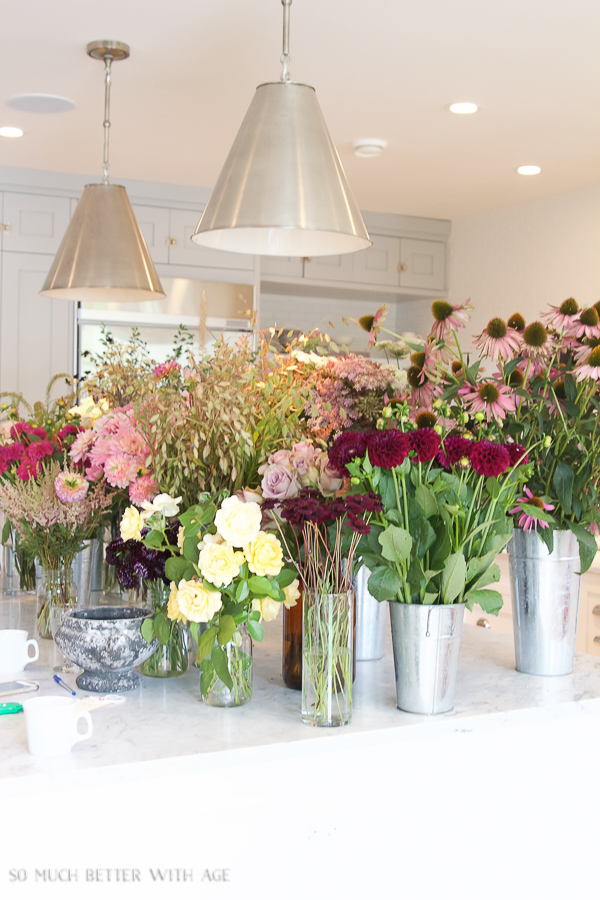 Yellow, red. pink and gold flowers in the kitchen.