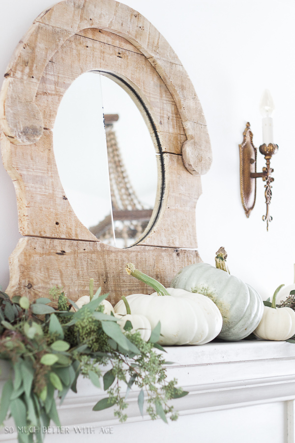 French limestone mantel, neutral decor, heirloom pumpkins, seeded eucalyptus