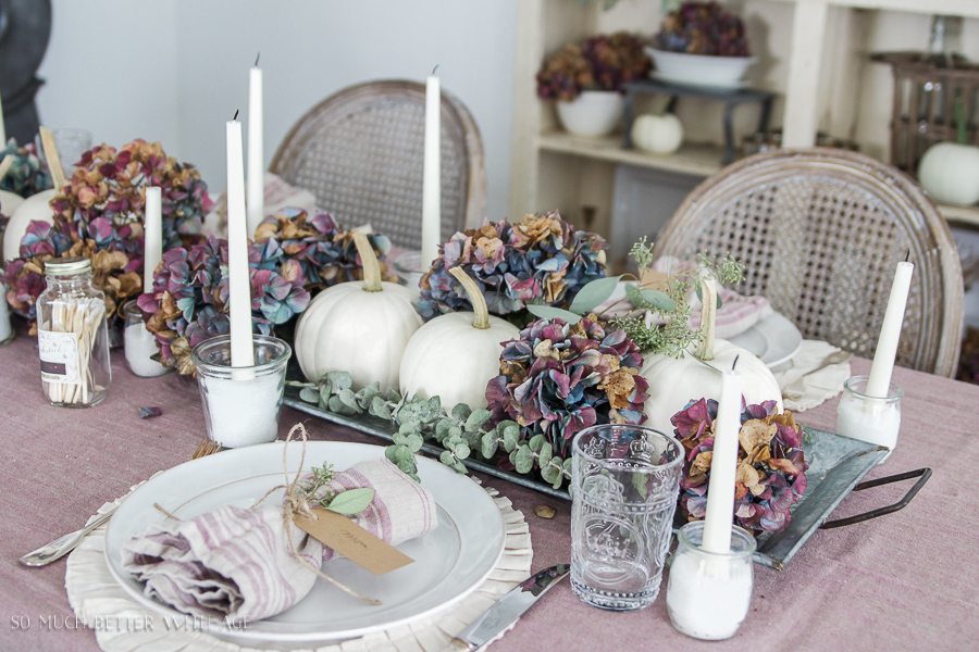 There is seeded eucalyptus on the table.