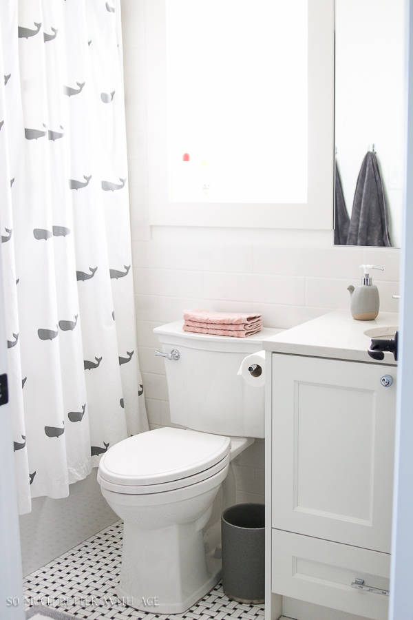 A white and black whale shower curtain.