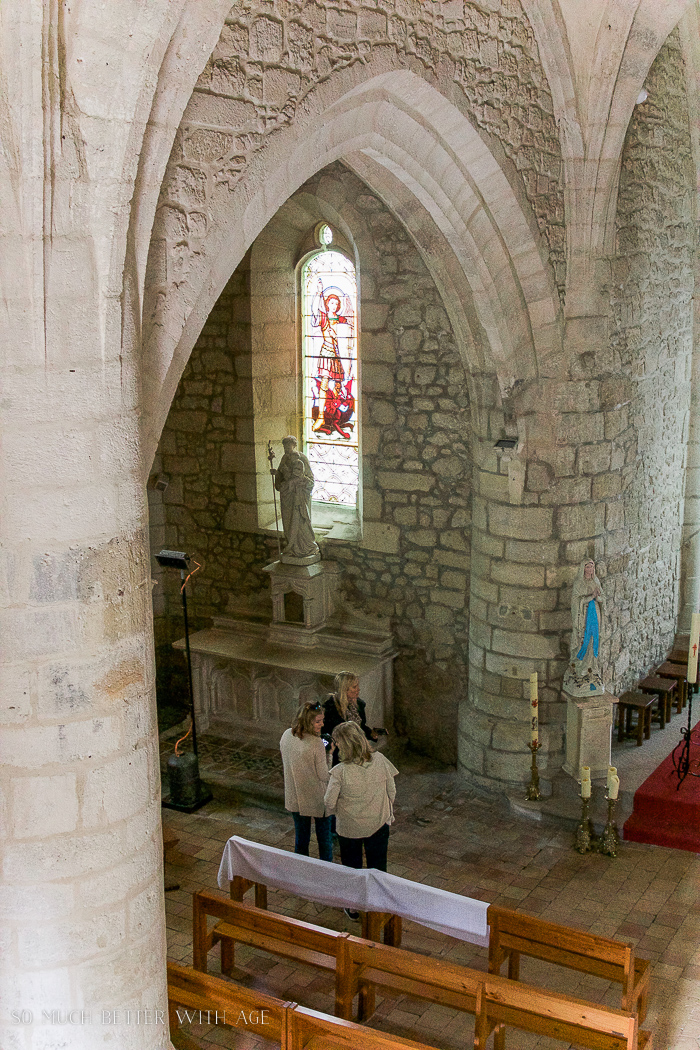 The details inside the church such as candelabras and statues.