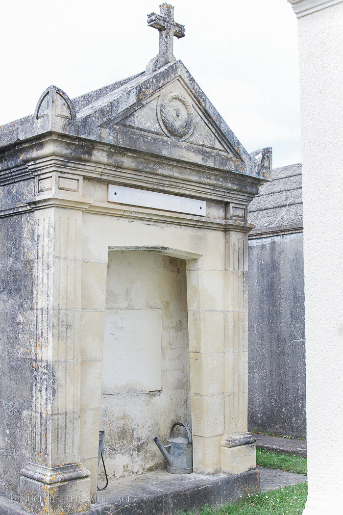  Stone church and cemetery French countryside watering can.