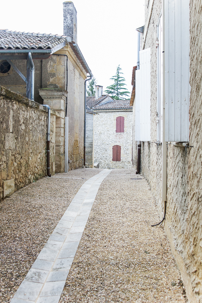 French town alley, cobblestone street.