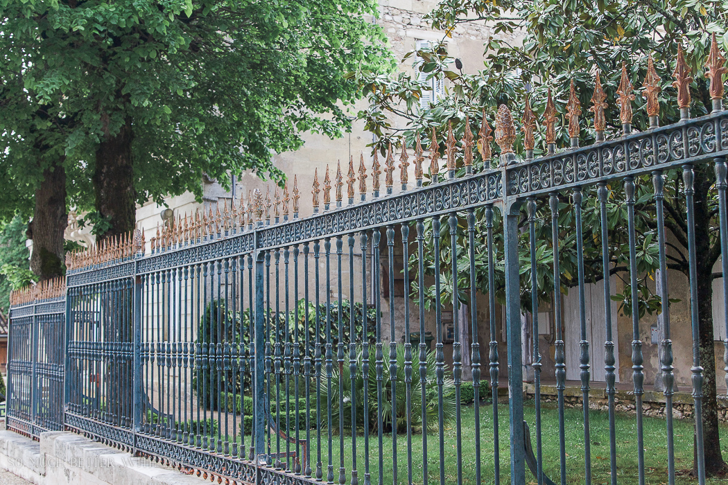 A wrought iron fence.