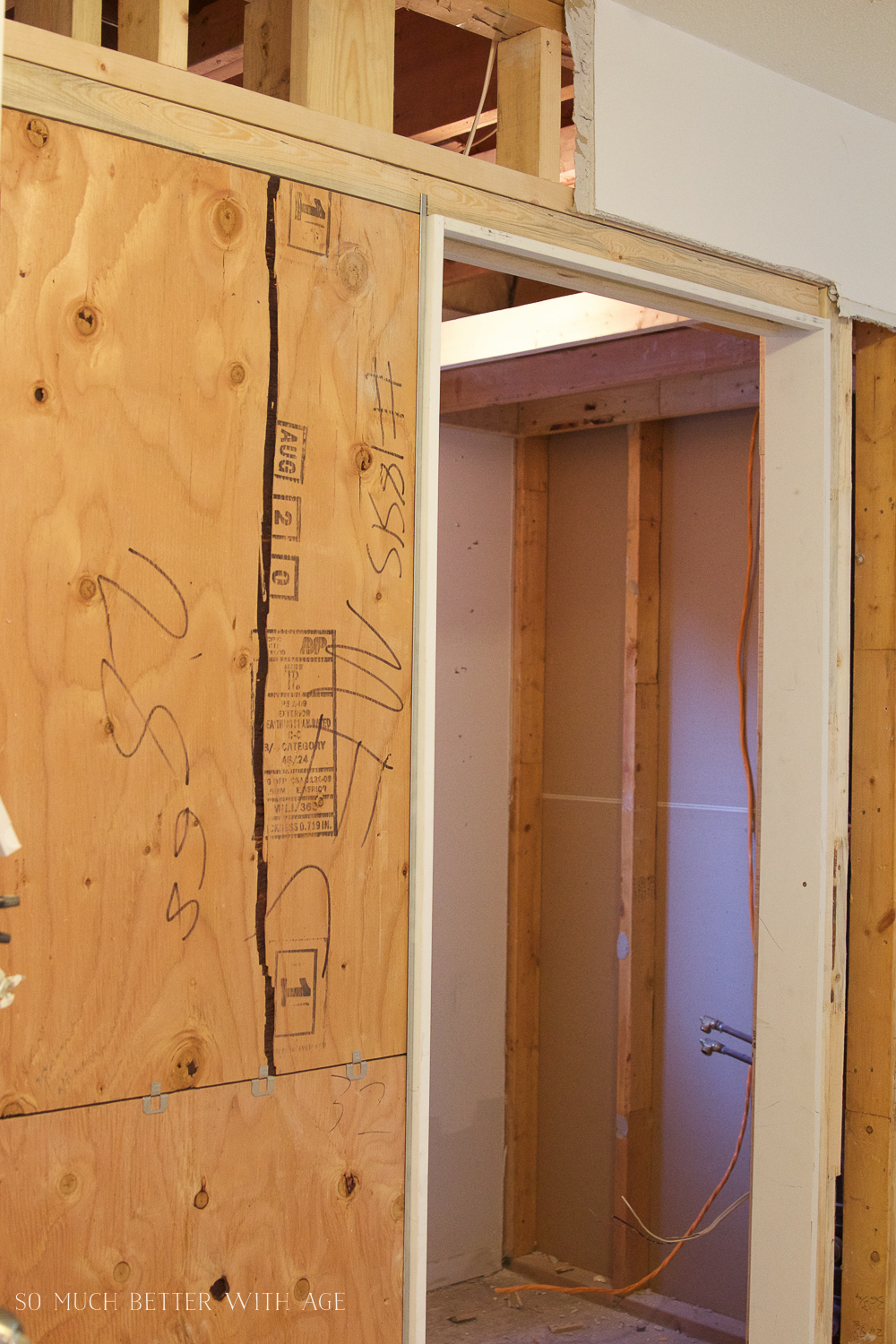 Installing a pocket door into the room.