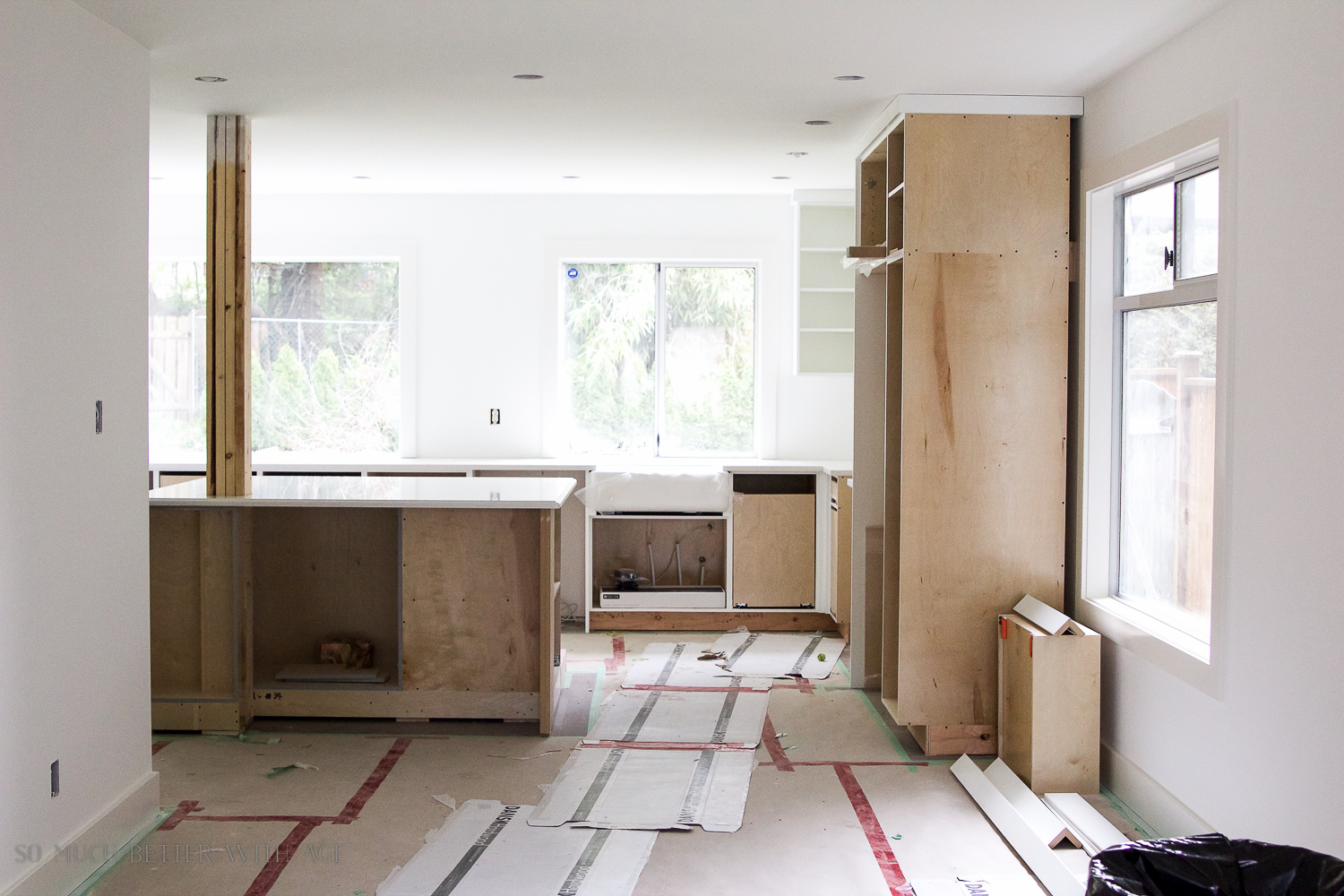 The unfinished cabinets in the kitchen.