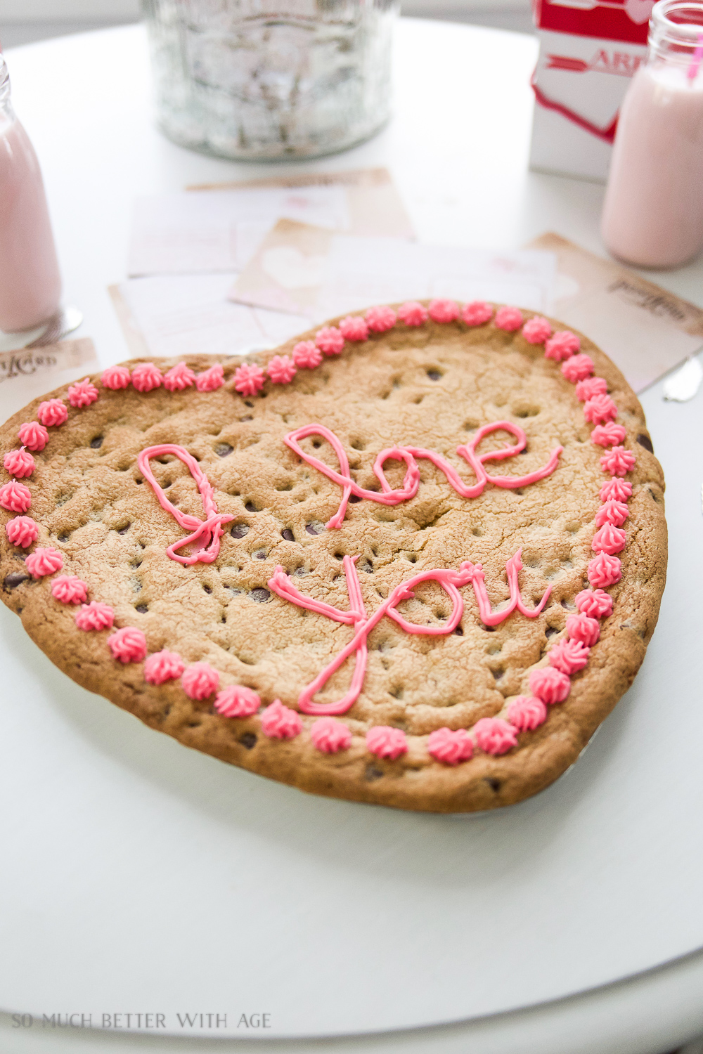 A heart shaped cookie on the counter.