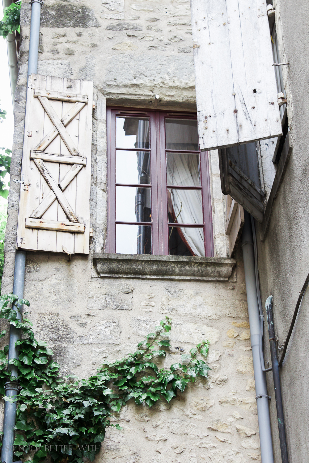 A window with shutters.