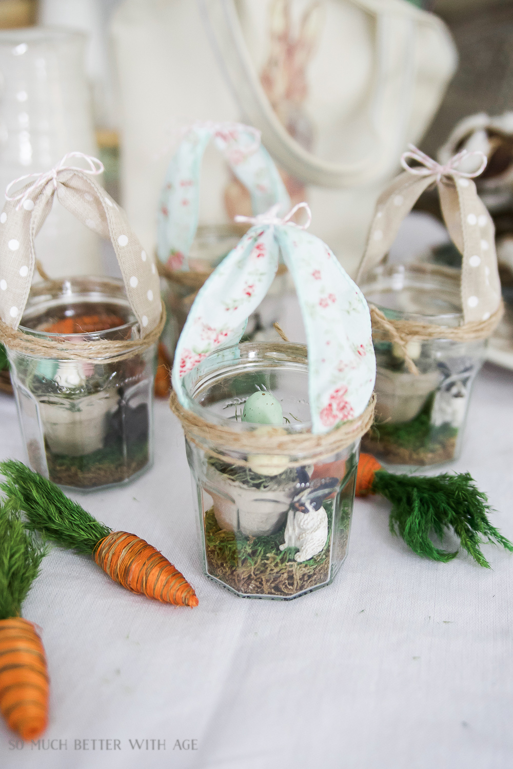 Glass Easter Jars with Bunny Ears / pretty decorated glass jars on table.