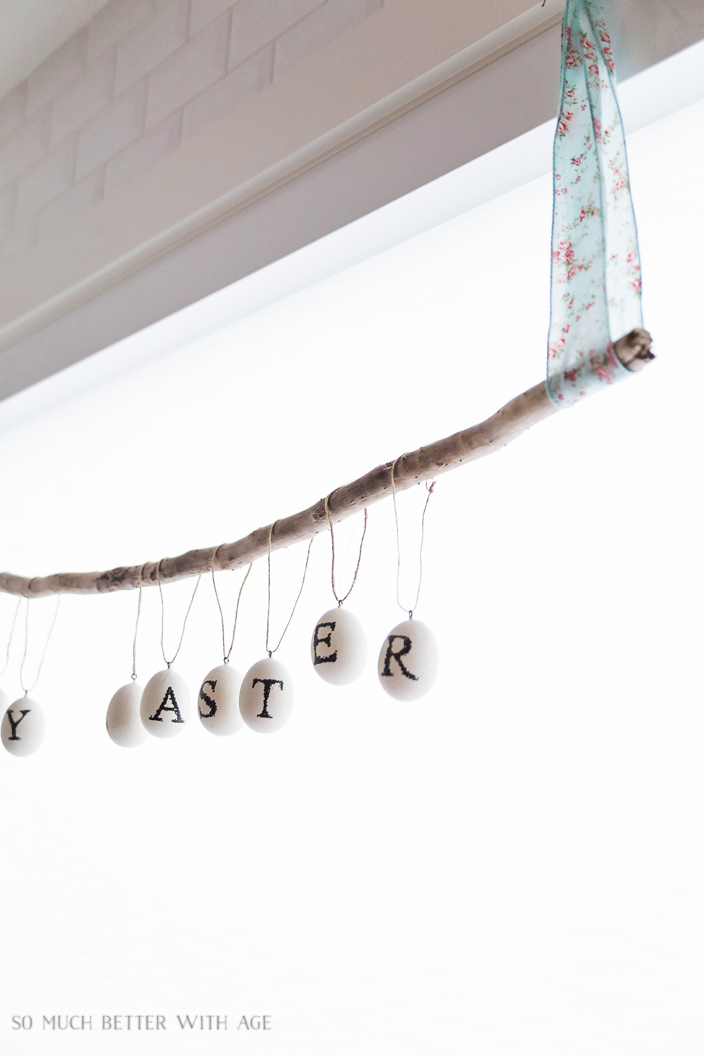 The garland hanging up in the window.