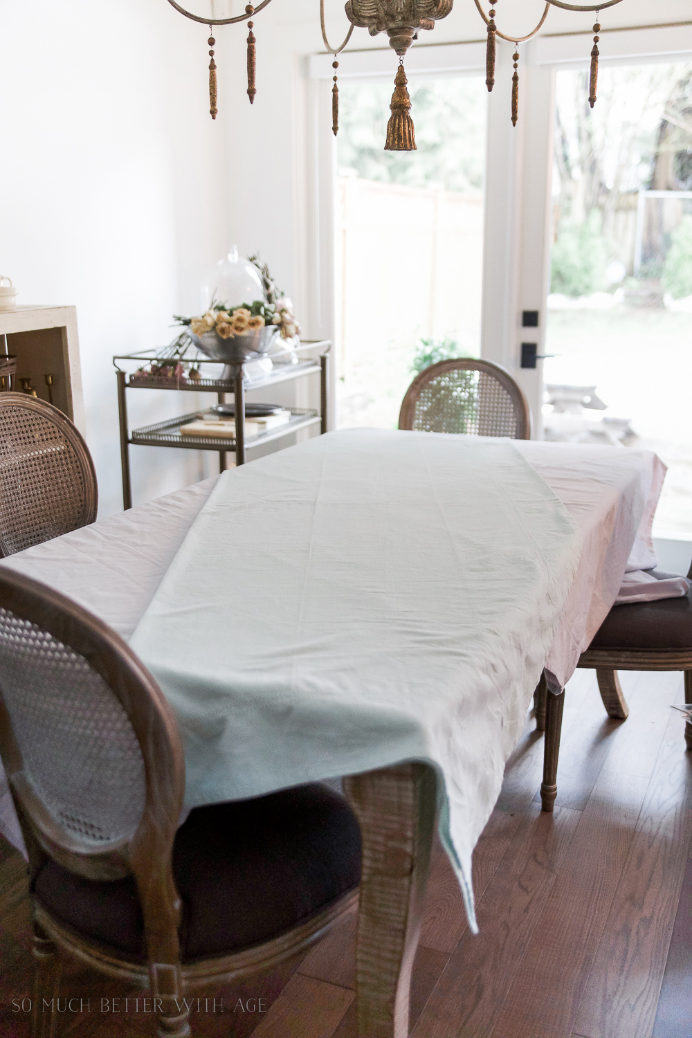 How to Set a Peter Rabbit Inspired Easter Table/layer over second tablecloth - So Much Better With Age