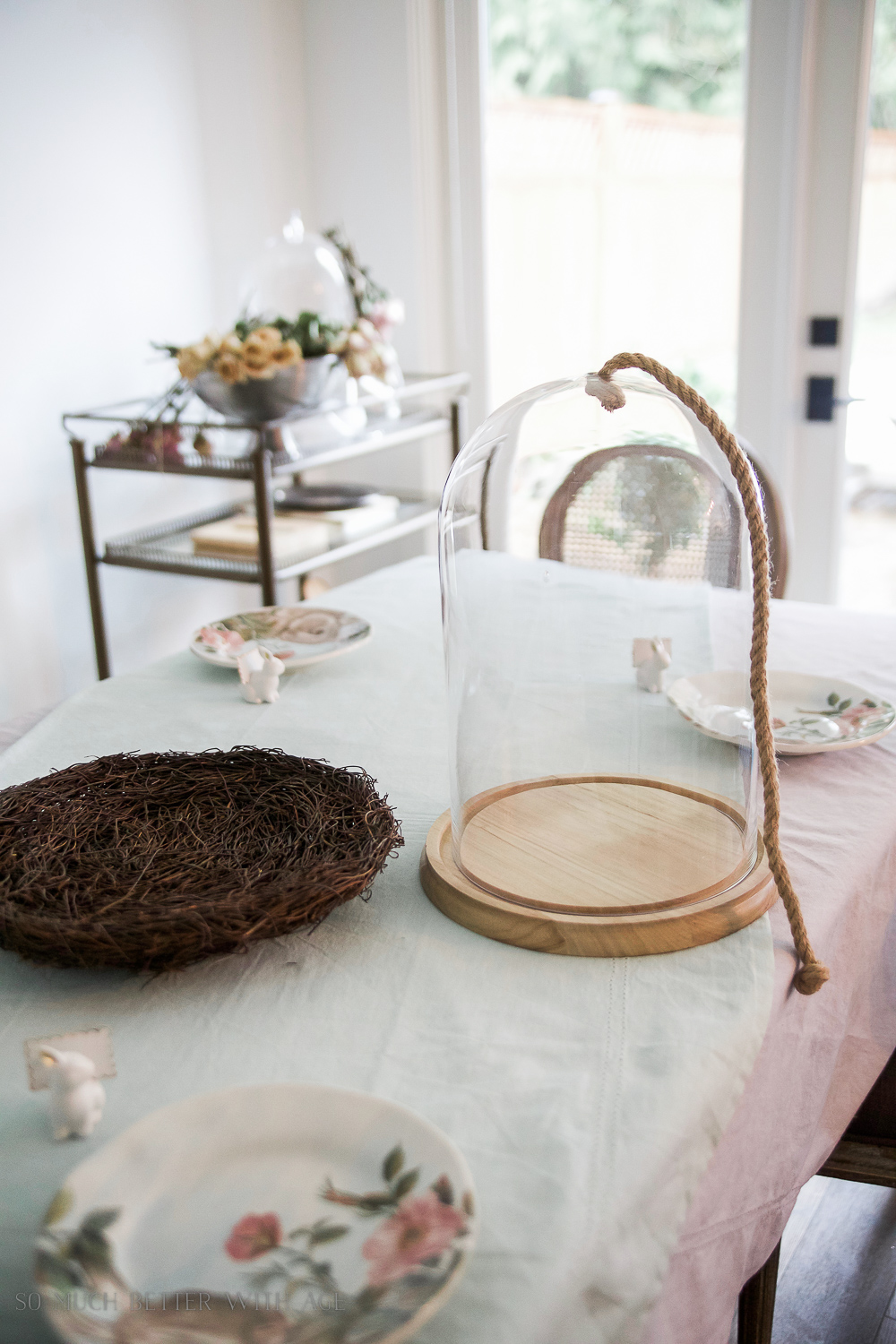 How to Set a Peter Rabbit Inspired Easter Table/cloche and plates on table - So Much Better With Age