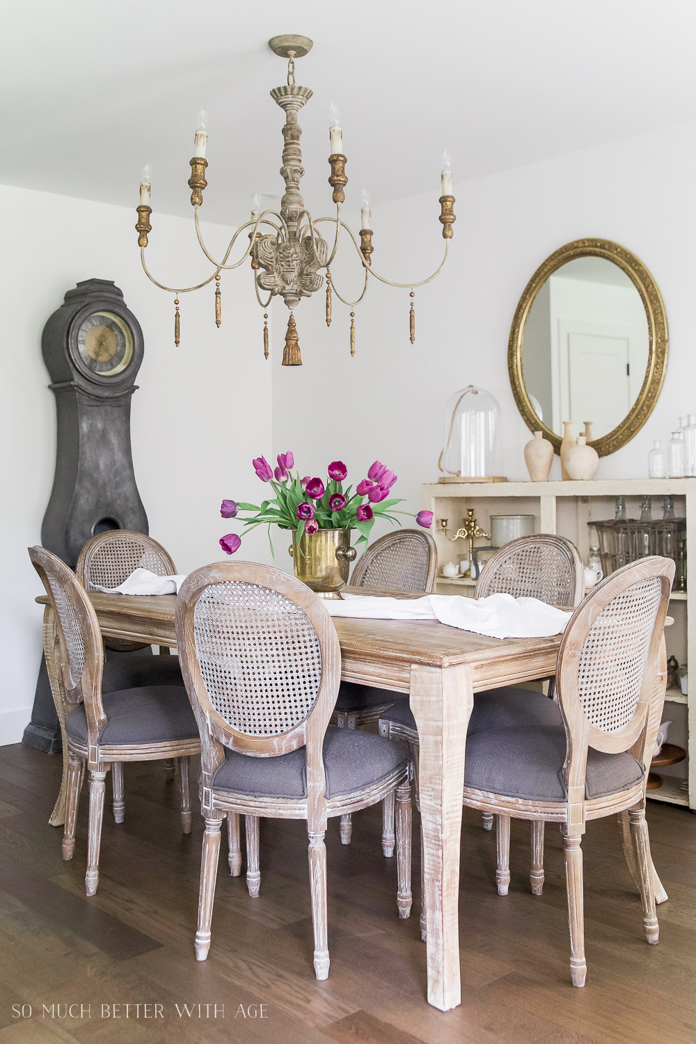 The dining room with new floors and a French vintage vibe.