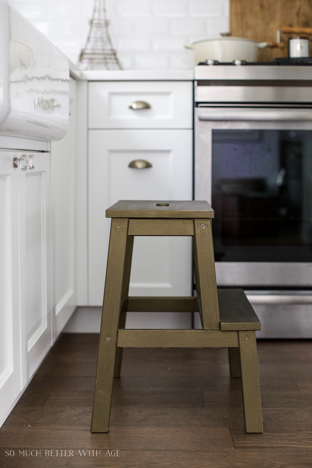 The painted stool in the kitchen.