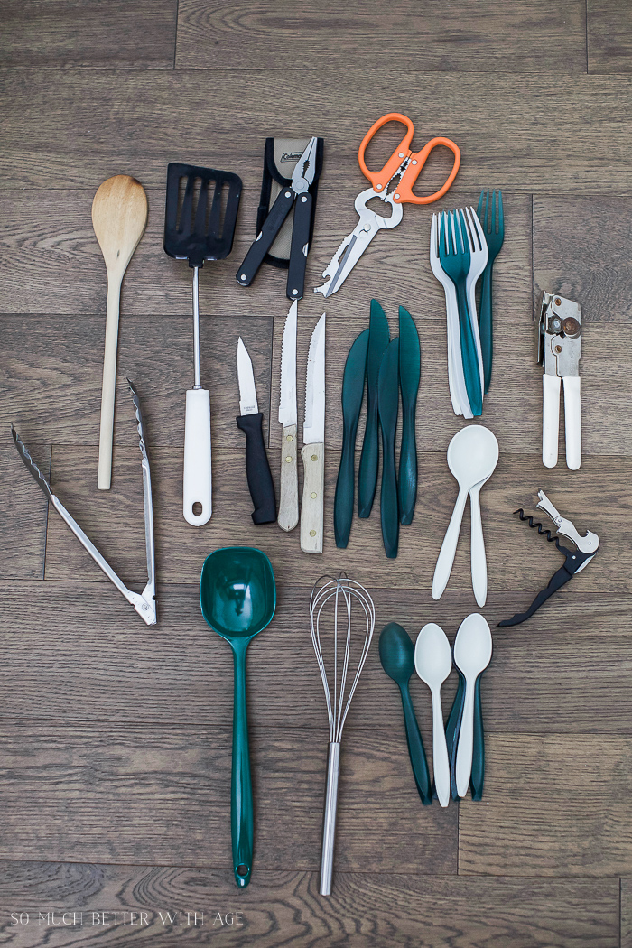 Kitchen utensils laid out for packing.