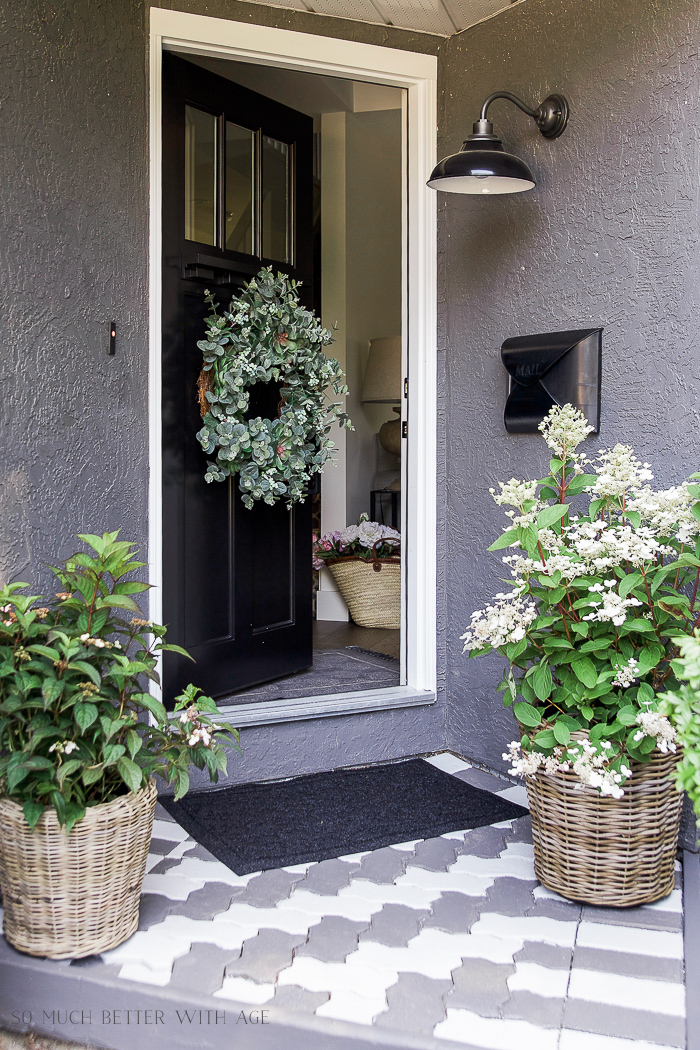 Front Porch Makeover with Painted Paving Stones/baskets of plants by front door - So Much Better With Age