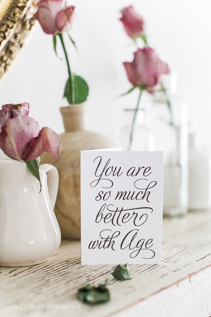 Roses beside a card saying you are so much better with age.