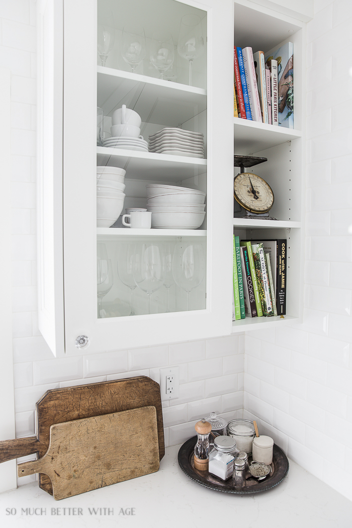 Complete Kitchen Supply List/French cutting boards, white plates in cupboard- So Much Better With Age