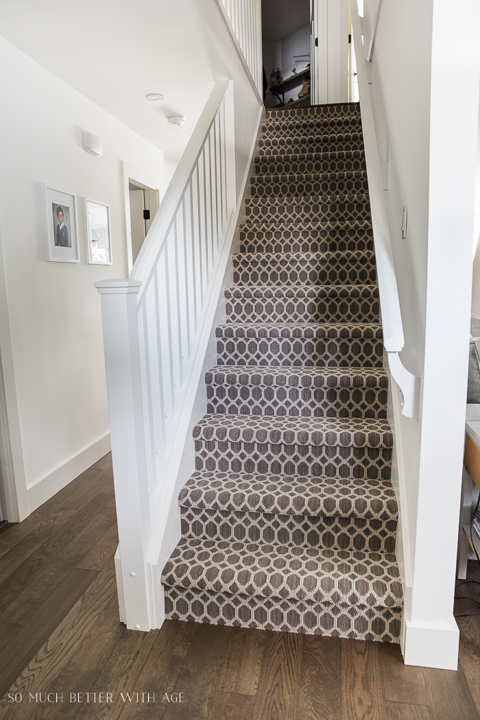 Trellis carpet in grey and white on the stairs.