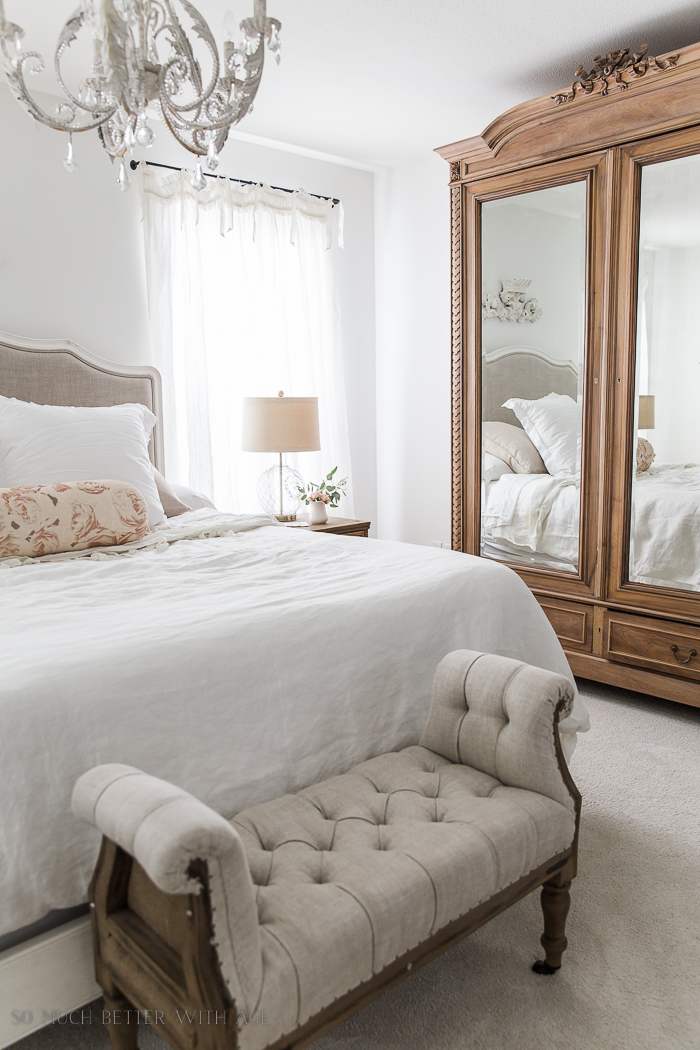 60 Items to Throw Out Today to Declutter/white bedroom with armoire - So Much Better With Age