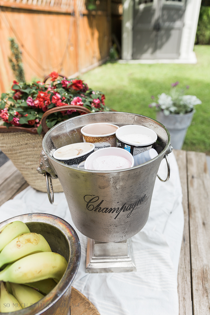 Ice tubs in a champagne bucket outside. 