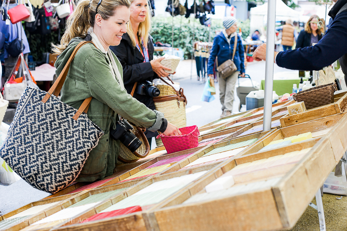 Jamie buying some soap in Riberac France.