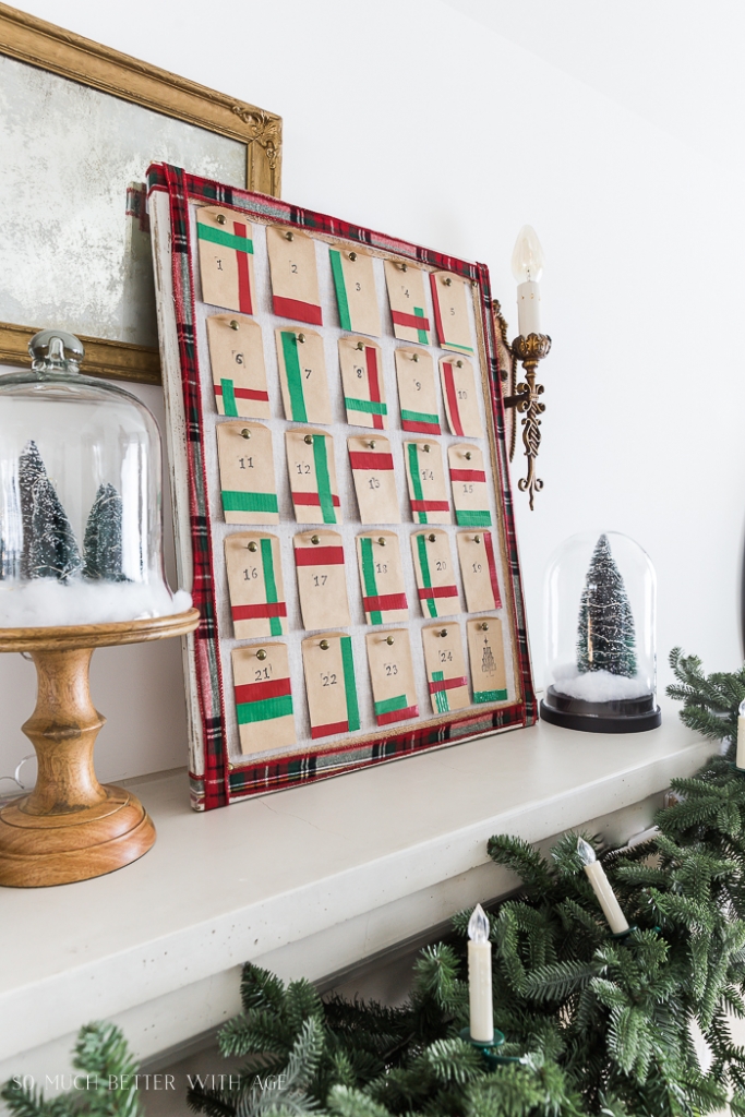 The advent calendar is displayed on the mantel.