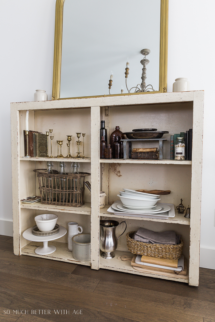 Open shelves with dining ware on it.